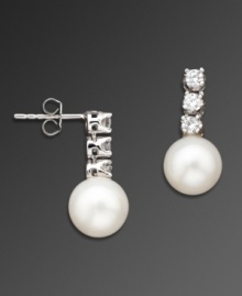 Simple elegance to refine your look. CRISLU's polished earrings highlight a freshwater pearl (8 mm) and three round-cut cubic zirconias (1 ct. t.w.) set in platinum over sterling silver. Approximate drop: 1 inch. Simple elegance to refine your look. CRISLU's polished earrings highlight a freshwater pearl (8 mm) and three round-cut cubic zirconias (1 ct. t.w.) set in platinum over sterling silver. Approximate drop: 1 inch.