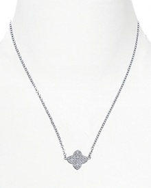 Distinctive and dazzling. This clover-shaped pendant from Crislu marries classic iconography with sparkling crystals. Distinctive and dazzling. This clover-shaped pendant from Crislu marries classic iconography with sparkling crystals.