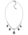 Carolee necklace illuminates your neckline with its breathtaking frontal design highlighting five pear-cut blue glass stones with clear accents. Set in silver tone imitation rhodium mixed metal. Approximate length: 16 inches + 2-inch extender. Approximate drop: 3/4 inch.