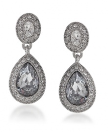 Frame your face with whimsical drops. Carolee earrings feature oval and pear-cut crystals surrounded by round-cut crystal accents in silver tone mixed metal. Approximate drop: 1-1/4 inches. Frame your face with whimsical drops. Carolee earrings feature oval and pear-cut crystals surrounded by round-cut crystal accents in silver tone mixed metal. Approximate drop: 1-1/4 inches.