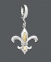 A French icon, the Fleur De Lis symbolizes royalty. Feel like a queen every time you wear this 14k gold and sterling silver charm. Features round-cut diamond accents. Lobster claw clasp. Approximate drop: 1-1/4 inches.