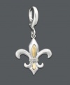 A French icon, the Fleur De Lis symbolizes royalty. Feel like a queen every time you wear this 14k gold and sterling silver charm. Features round-cut diamond accents. Lobster claw clasp. Approximate drop: 1-1/4 inches.