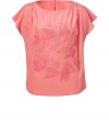 Feminine top in fine, melon-colored silk - Fashionable, slim tunic cut with round neck and flutter short sleeve - Small button closure at back - Elegant embroidered front - Boho look upgrades simple basics - Style with cut-off denim shorts or skinny jeans and flat sandals or ankle boots