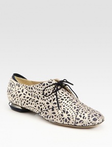 Lacy cutout details and a slight metal heel define this timeless suede and satin style. Metal and suede heel, ½ (15mm) 65% suede/35% satin upper Leather lining and sole Padded insole Made in Italy Lacy cutout details and a slight metal heel define this timeless suede and satin style. Metal and suede heel, ½ (15mm) 65% suede/35% satin upper Leather lining and sole Padded insole Made in Italy