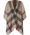 An ultra luxe alternative to outerwear, Burberry Londons giant check cape lends an elegant, iconic polish to every outfit - Wrapped front, longer drape at sides - Wear over slim fit separates with turtlenecks and sleek ankle boots