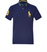 Get your hands on the must-have piece for the upcoming season - This classic polo shirt is designed in fine cotton by Ralph Lauren, the master of American preppy style - Traditional navy, with yellow, embroidered logo on chest and number at sleeve - Slim cut with longer back than front - Pairs well with jeans, chinos or shorts on the weekends or after-hours