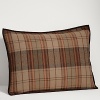 A rich plaid pattern and soft velvet binding infuse this sham with heritage inspiration and luxurious texture.