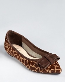 In giraffe printed haircalf, these Delman flats feel ladylike in a pointed silhouette, embellished with a soft suede bow. In giraffe printed haircalf, these Delman flats feel ladylike in a pointed silhouette, embellished with a soft suede bow.