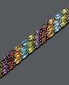 Three rows of gemstones in a myriad of vibrant color, this bracelet will turn heads. Bracelet features oval-cut blue topaz (1/4 ct. t.w.), garnet (1/4 ct. t.w.), peridot (1/4 ct. t.w.), amethyst (1/5 ct. t.w.) and citrine (1/5 ct. t.w). Set in sterling silver.  Approximate length: 7-1/2 inches.