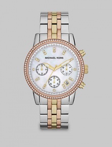 From the Ritz Collection. A timepiece as technical as it is beautiful with three stunning tones and glittering crystals. Quartz movementWater resistant to 5 ATMRound stainless steel case, 36mm (1.4) Crystal encrusted bezelMother-of-pearl dialCrystal hour markersDate display between 4 and 5 o'clockSecond hand Tri-tone stainless steel link braceletImported From the Ritz Collection. A timepiece as technical as it is beautiful with three stunning tones and glittering crystals. Quartz movementWater resistant to 5 ATMRound stainless steel case, 36mm (1.4) Crystal encrusted bezelMother-of-pearl dialCrystal hour markersDate display between 4 and 5 o'clockSecond hand Tri-tone stainless steel link braceletImported