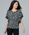 A style-forward flutter sleeve silhouette combines with an adorable heart print for Style&co.'s latest petite top.