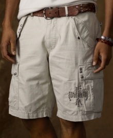 Cut for a slim fit with heavy washing, utility pockets and plenty of studded embellishments, this rugged chino twill cargo short calls on inspiration from the Great Southwest to achieve its rustic look. Cut for a slim fit with heavy washing, utility pockets and plenty of studded embellishments, this rugged chino twill cargo short calls on inspiration from the Great Southwest to achieve its rustic look.