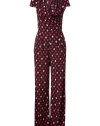 Playful and punchy with an eye-catching print, Catherine Malandrinos stretch silk jumpsuit lends a fun, contemporary twist to your look - Draped V-neckline, cap sleeves, draped wrapped bodice, self-tie back sash, hidden back zip - Fitted bodice, wide-leg pants - Wear with platforms, a blazer, and carryall tote to work