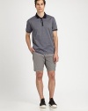 Regular-fitting, solid shorts are highlighted with slanted front, rear flap pockets and a side cargo pocket for a utilitarian feel, rendered in breathable, lightweight cotton for endless comfort.Flat-front styleSide slash, back flap pocketsFront coin, side cargo pocketInseam, about 9CottonDry cleanImported