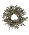 Welcome the winter. The Winter Ice pine cone wreath lets you decorate with a touch of lifelike evergreen beauty, making it perfect for the holidays. From Winward.