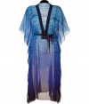 Luxurious caftan of a fine, blue patterned cotton-silk blend - Glamorous and elegant in a slightly transparent style - Features feminine, embroidered V-neckline, batwing sleeves, and flattering waist belt - Fashionable for the beach, at parties or events, with a bikini and thongs, or with flowing pants, tank, and sexy heels