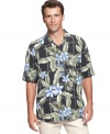 Foliage fashion. Get firmly rooted in summer style with this silk shirt from Tommy Bahama.