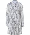 Hippie-chic looks get a dressy, feminine finish in Antik Batiks cool white feather print silk dress, perfect for taking office looks to sweet city cocktails - Short stand-up collar, long sleeves, buttoned cuffs, partial button-down front, drawstring waistline, softly tailored fit - Pair with an oversized blazer and minimalist pumps