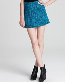 Alice + Olivia delivers a hyper-modern take on classic tweed with this neon-hued mini skirt that works the office, then wows at night. Alice + Olivia delivers a hyper-modern take on classic tweed with this neon-hued mini skirt that works the office, then wows at night.