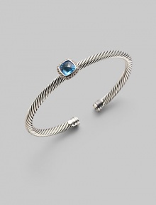 From the Noblesse Collection. Shimmering pavé diamonds frame a faceted blue topaz, delicately perched atop a cabled silver cuff. Diamonds, 0.14 tcw Blue topaz Cable, 5mm Sterling silver Diameter, about 2¼ Made in USA From the Noblesse Collection. Shimmering pavé diamonds frame a faceted blue topaz, delicately perched atop a cabled silver cuff. Diamonds, 0.14 tcw Blue topaz Cable, 5mm Sterling silver Diameter, about 2¼ Made in USA
