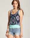 Rock the global trend in this Free People tribal print tank--lively with pops of pink and turquoise embroidery juxtaposed against earthy tones for the perfect summer look.