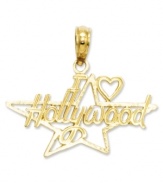 The perfect charm for the aspiring actress. This I heart Hollywood charm features an intricate, cut-out design and star shape. Crafted in 14k gold. Chain not included. Approximate length: 8/10 inch. Approximate width: 7/10 inch.