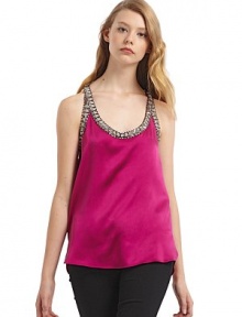 THE LOOKOrnately beaded edgesU necklineSleevelessRacerbackTHE FITAbout 26 from shoulder to hemTHE MATERIALSilkCARE & ORIGINDry cleanMade in USA of imported fabric THE LOOKOrnately beaded edgesU necklineSleevelessRacerbackTHE FITAbout 26 from shoulder to hemTHE MATERIALSilkCARE & ORIGINDry cleanMade in USA of imported fabric