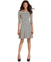 ECI puts a twist on the striped dress with a clever crisscross detail at the waist.