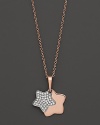 Double star pendant, one set with twinkling diamonds, in 14K. rose gold.