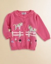 Floral ponies gracefully graze in a flower-sprinkled pasture on the front of a charming cardigan with a pretty ruffle.Ribbed crewneck with ruffleSoft gathering at the shouldersLong sleeves with ribbed cuffsRibbed button placketFront appliqués and embroideryRibbed bottomCottonMachine washImported Please note: Number of buttons may vary depending on size ordered. 