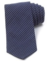 Thin tonal stripes augment your handsome professional look with this soft tie cut in a classic width for timeless appeal.