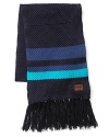 A chunky woven scarf with stripe trim and fringes at the ends.