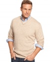 Keep warm in this solid v-neck sweater by Weatherproof Vintage with vintage appeal to keep your look trendy.