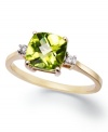 An elegant accent piece in your favorite hue. This exquisite ring features a cushion-cut peridot (1-5/8 ct. t.w.) and round-cut diamond accents at the sides. Set in 14k gold.