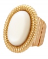 Regally chic. T Tahari's stunning statement ring features an intricate wrapped design in antique gold tone mixed metal with a polished ivory resin stone. Base metal is nickel-free for sensitive skin. Ring stretches to fit finger.