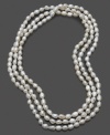 Add top-notch elegance to your everyday look with this striking cultured freshwater pearl (7-8 mm) necklace. Approximate length: 64 inches.