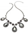 Alfani's statement necklace is crafted from hematite tone mixed metal with an array of black and gray glass stones for an alluring effect. Crafted in hematite tone mixed metal. Approximate length: 18 inches + 3-inch extender. Approximate drop: 1-1/2 inches.