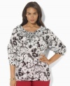 A bold floral print lends feminine appeal to this Lauren by Ralph Lauren's plus size top, designed in light-as-air cotton voile with voluminous ruffles for a graceful touch.