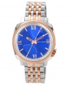 A soothing blue dial blends with rosy accents on this refreshing watch from Vince Camuto.
