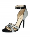 Out-sparkle the competition with the Laren single sole glitter sandals from GUESS! A glitter finish vamps up the covered heel and ankle strap.