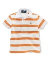A short-sleeved rugby is rendered in breathable woven cotton with a preppy striped pattern for a handsome finish.