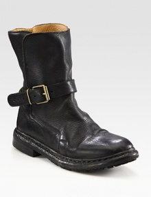 Rustic leather design with an adjustable, wrap-around belt and slight stacked heel. Stacked heel, 1 (25mm)Shaft, 8Leg circumference, 12Leather upperPull-on styleLeather lining and solePadded insoleMade in Italy Rustic leather design with an adjustable, wrap-around belt and slight stacked heel. Stacked heel, 1 (25mm)Shaft, 8Leg circumference, 12Leather upperPull-on styleLeather lining and solePadded insoleMade in Italy