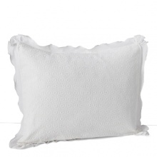 Embroidered eyelet and a ruffle trim accent this feminine, decorative pillow from DKNY. Embroidered eyelet and a ruffle trim accent this feminine, decorative pillow from DKNY.