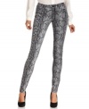 MICHAEL Michael Kors' petite skinny jeans make a statement with a bold snakeskin print.