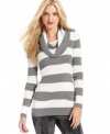 Snuggle into this DKNY Jeans petite sweater, complete with on-trend colorblocked stripes and a body-con fit.