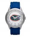 Show your University of Florida loyalty every second of the day with this signature team watch from Fossil. Blue polyurethane strap and round stainless steel case. Bezel etched with numerals and stick indices. White dial features large Gators logo, printed minute track and stick indices at outer ring, date window at three o'clock and luminous hands. Quartz movement. Water resistant to 100 meters. Eleven-year limited warranty.