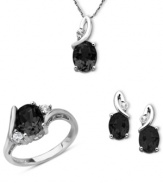 Nothing but class. This three-piece jewelry set features a pendant, ring and drop earrings that highlight oval-cut onyx (5-1/5 ct. t.w.) and round-cut white topaz (3/8 ct. t.w.). Set in sterling silver. Approximate length (pendant): 18 inches. Approximate drop (pendant): 3/4 inch. Ring Size 7.