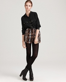 This Dolce Vita silk romper re-envisions the trend-right style with cooler weather in mind. A classic pocket shirt featuring gold-toned buttons fuses with bold printed shorts for a season of inimitable style. This Dolce Vita silk romper re-envisions the trend-right style with cooler weather in mind. A classic pocket shirt featuring gold-toned buttons fuses with bold printed shorts for a season of inimitable style.