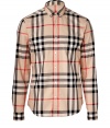 Effortless and iconic with its oversized check, Burberry Brits classic cotton button-down lends a characteristic cool edge to every outfit - Small button-down collar, long sleeves, buttoned cuffs, button-down front, shirttail hemline - Straight silhouette - Wear with everything from jeans and sneakers to tailored trousers and Chelsea boots