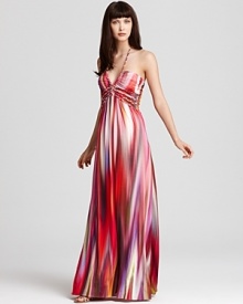 A streaky print of vibrant color enlivens this Sky maxi dress, cut in a halter silhouette with intricately braided details. A streaky print of vibrant color enlivens this Sky maxi dress, cut in a halter silhouette with intricately braided details.